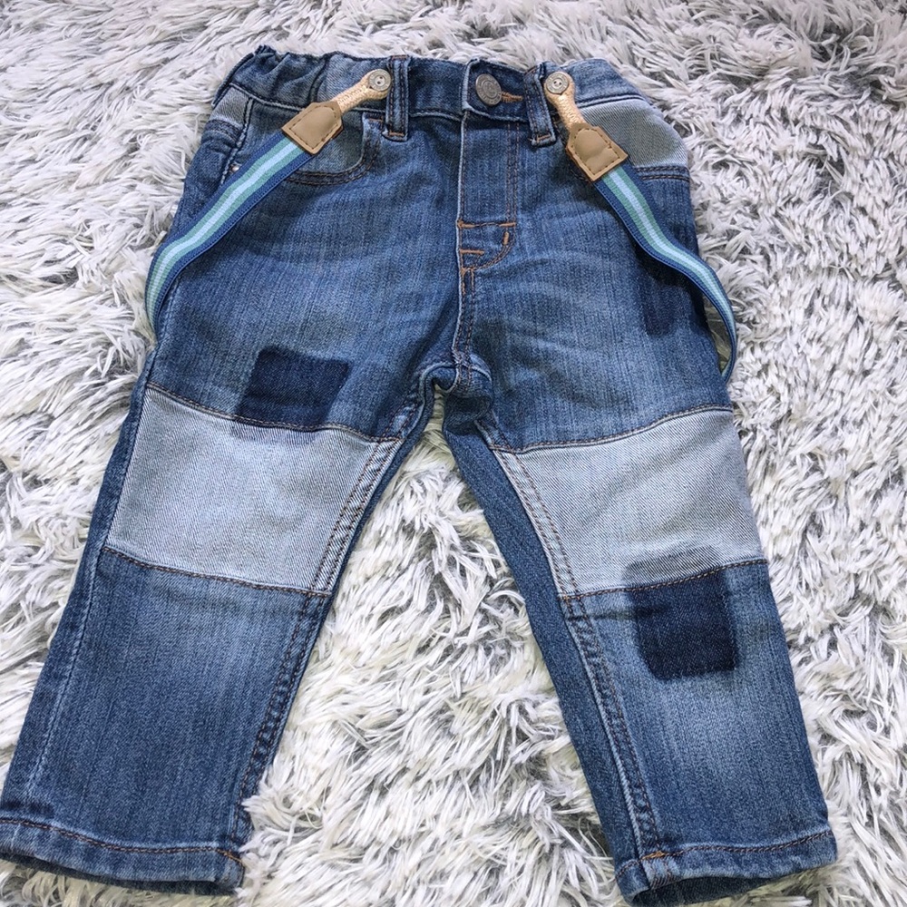 Patched jeans with suspenders